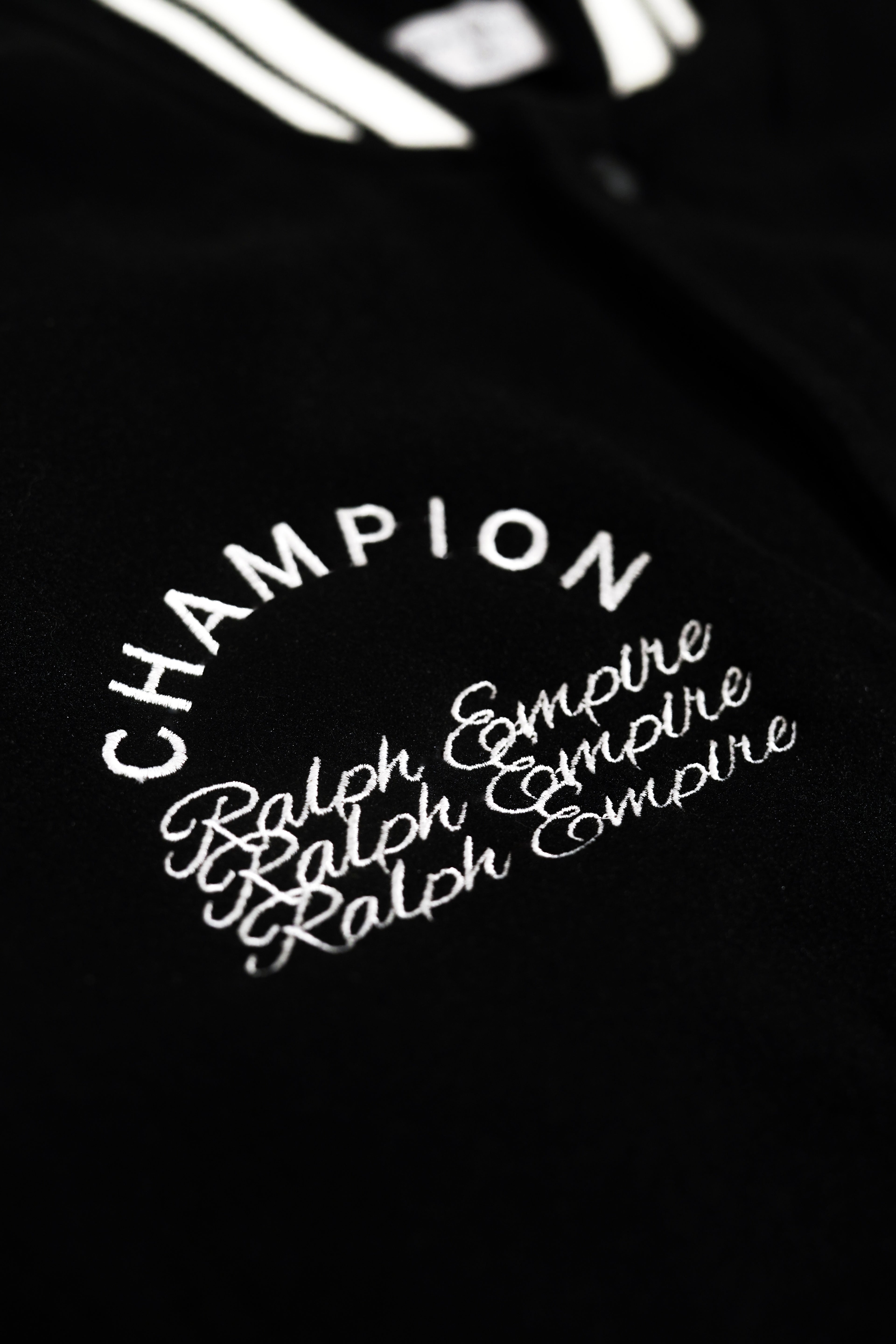 Empire Elite – Premium Collegejacke – Schwarz. 